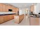 Spacious kitchen with modern appliances, custom cabinets, and a center island at 808 Hickory Glen Dr, Seffner, FL 33584