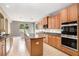 Bright and spacious kitchen with an island, built-in appliances, and ample storage space at 808 Hickory Glen Dr, Seffner, FL 33584