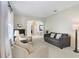 Inviting living room with comfortable seating and an archway leading to other rooms at 808 Hickory Glen Dr, Seffner, FL 33584
