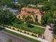 Aerial view of the mediterranean-style home, featuring a barrel tile roof and manicured landscaping at 843 17Th N Ave, St Petersburg, FL 33704