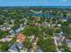 This bird's eye view showcases a beautiful home surrounded by mature trees and landscaping at 843 17Th N Ave, St Petersburg, FL 33704