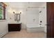 Charming bathroom featuring a classic clawfoot tub and a stylish vanity with dark wood at 843 17Th N Ave, St Petersburg, FL 33704
