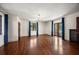 Spacious bedroom with hardwood floors, natural lighting, balcony access, and designer touches at 843 17Th N Ave, St Petersburg, FL 33704