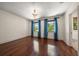 Bright bedroom has beautiful hardwood floors, a chandelier, and lots of natural light at 843 17Th N Ave, St Petersburg, FL 33704