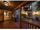 Charming courtyard featuring brick flooring, potted plants, and a cozy outdoor sitting area with hanging floral arrangements at 843 17Th N Ave, St Petersburg, FL 33704