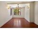 The dining room features beautiful terracotta tile flooring and a decorative chandelier at 843 17Th N Ave, St Petersburg, FL 33704