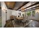 Bright dining room with wood-beamed ceiling, natural light, and seating for six at 843 17Th N Ave, St Petersburg, FL 33704