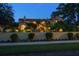 Inviting home featuring a barrel tile roof, mature trees, and well-maintained landscaping at 843 17Th N Ave, St Petersburg, FL 33704
