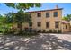Rear exterior view showing the side of the home with multiple windows at 843 17Th N Ave, St Petersburg, FL 33704