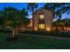 Charming Mediterranean-style home with lush landscaping, lighting and a barrel tile roof at 843 17Th N Ave, St Petersburg, FL 33704