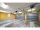Empty three-car garage with ample space at 843 17Th N Ave, St Petersburg, FL 33704