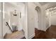 Hallway featuring arched doorway and dark wood flooring at 843 17Th N Ave, St Petersburg, FL 33704