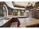 Gourmet kitchen features a custom sink, arched windows, and dark wood cabinets at 843 17Th N Ave, St Petersburg, FL 33704