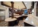 Custom gourmet kitchen features dark wood cabinetry, unique tile, and marble countertops at 843 17Th N Ave, St Petersburg, FL 33704