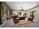 Cozy living room featuring built-in bookshelves and an elegant seating area with ample natural light at 843 17Th N Ave, St Petersburg, FL 33704