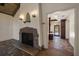 Living room featuring stone fireplace and unique tile floors at 843 17Th N Ave, St Petersburg, FL 33704