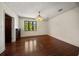 Living room featuring hardwood floors, chandelier lighting, and window at 843 17Th N Ave, St Petersburg, FL 33704