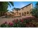 Lovely backyard showcasing a swimming pool and patio with vibrant flowers, perfect for enjoying outdoor living at 843 17Th N Ave, St Petersburg, FL 33704