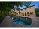 Backyard view of house highlighting swimming pool and patio area, offering a perfect spot for relaxation and entertainment at 843 17Th N Ave, St Petersburg, FL 33704