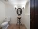 Stylish powder room features a unique vessel sink, decorative mirror and sconces at 843 17Th N Ave, St Petersburg, FL 33704
