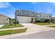 Charming two-story home with a well-manicured lawn and a two-car garage at 8595 Prairie Creek Dr, New Port Richey, FL 34655