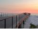 Picturesque boardwalk featuring ocean views and a tranquil setting perfect for a sunset stroll at 880 Mandalay Ave # N109, Clearwater Beach, FL 33767