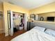 Bedroom closet with ample storage, including shelving and clothes racks at 880 Mandalay Ave # N109, Clearwater Beach, FL 33767
