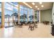 Bright lobby with floor to ceiling windows with views of the ocean and seating at 880 Mandalay Ave # N109, Clearwater Beach, FL 33767