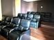 Comfortable theater room featuring plush, reclining seating for the ultimate viewing experience at 880 Mandalay Ave # N109, Clearwater Beach, FL 33767