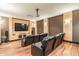 Cozy theater room with tiered seating, large screen, and modern entertainment setup at 880 Mandalay Ave # N109, Clearwater Beach, FL 33767