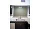 Contemporary kitchen sink area with stainless steel fixtures, granite countertops, and stylish backsplash at 9516 Newdale Way # 101, Riverview, FL 33578