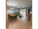 Spacious living and dining area with tile flooring, modern furniture, and ample natural light at 9516 Newdale Way # 101, Riverview, FL 33578