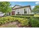 Charming single-story home with well-manicured landscaping and a two-car garage at 10420 Echo Dock Loop, San Antonio, FL 33576