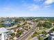 An aerial view reveals a vibrant coastal community with marina access and convenient road networks at 105 E Davis Blvd # A, Tampa, FL 33606