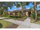 Charming home exterior with well-manicured landscaping and inviting entrance at 11308 Temperley Pl, Tampa, FL 33625