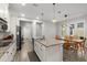 Spacious kitchen with island, granite countertops and stainless steel appliances at 11308 Temperley Pl, Tampa, FL 33625