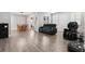 Spacious living room with sleek flooring and ample natural light at 11308 Temperley Pl, Tampa, FL 33625