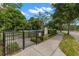 Enclosed playground with a walking path is the perfect place to play! at 11308 Temperley Pl, Tampa, FL 33625