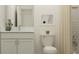 Modern bathroom featuring a sleek white vanity with a marble countertop and a stylish bathtub-shower combination at 11554 71St E Ave, Palmetto, FL 34221
