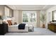 Bedroom with large windows and natural light, showing stylish furnishings and a comfortable layout at 11744 E 71St Ter, Palmetto, FL 34221