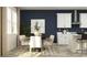 Open dining space with modern table, chic chairs, and stylish decor, perfect for Gathering meals and entertaining at 11744 E 71St Ter, Palmetto, FL 34221