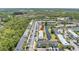 Aerial view of the home's location within a lush, well-maintained community with a pond at 12323 Country White Cir, Tampa, FL 33635