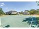 A community basketball court with ample space for recreational activities and sports at 12323 Country White Cir, Tampa, FL 33635