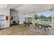 A community area with patio seating near the pool, creating a relaxing and social space at 12323 Country White Cir, Tampa, FL 33635