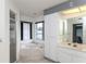 Bright bathroom featuring a large soaking tub, shower, and large cabinets at 128 Torrington St, Port Charlotte, FL 33954