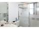 Bathroom featuring a shower stall and single sink at 128 Torrington St, Port Charlotte, FL 33954