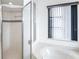 Shower area is featured in this bathroom at 128 Torrington St, Port Charlotte, FL 33954