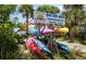 Outdoor kayak rental location with colorful kayaks available for rent and tours at 128 Torrington St, Port Charlotte, FL 33954