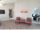 Bright living room with wood floors, recessed lighting, and stylish decor at 128 Torrington St, Port Charlotte, FL 33954