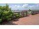 Scenic view of the waterfront pier with lush foliage growing along the railing at 128 Torrington St, Port Charlotte, FL 33954